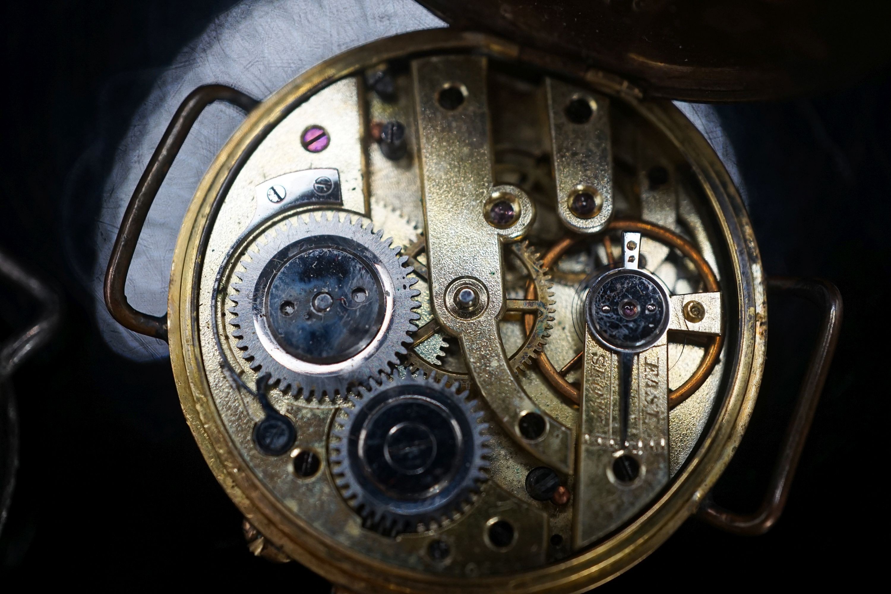 A gentleman's early 20th century continental 18k half hunter wrist watch, case diameter 33mm, gross weight 32.7 grams, together with two other silver watches.